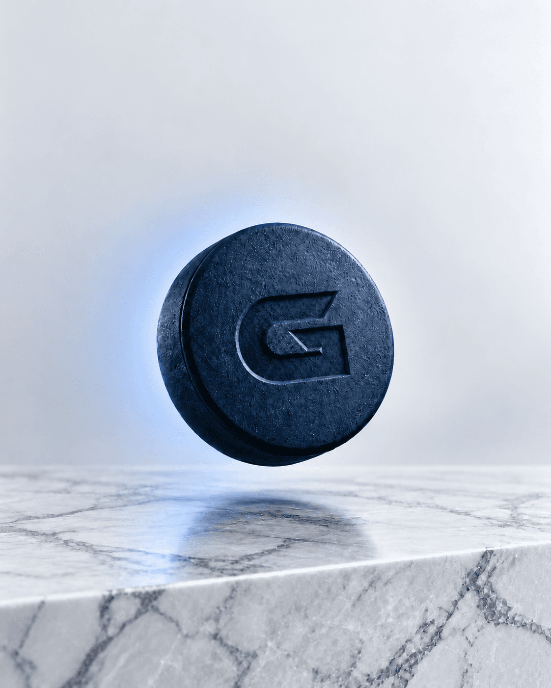 Grip navy pill on white marble